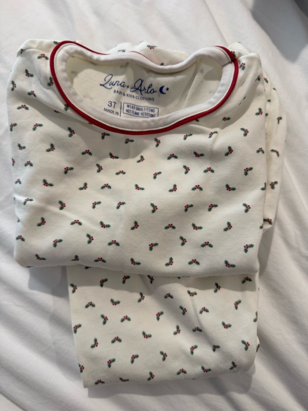 Cream Holiday Holly Print Kids Pajamas with Red Trim